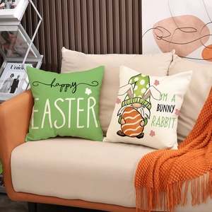Set of two Easter decorative pillow covers featuring gnome and rabbit on cream and green canvas
