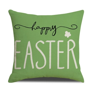 Detail of green Easter pillowcase fabric texture with Happy Easter text print