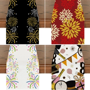 Detail showing four Happy New Year table runner designs with fireworks and party icons