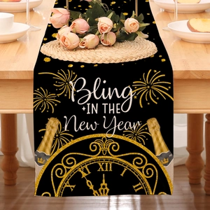 Detail of Happy New Year table runner featuring black linen and gold clock printing