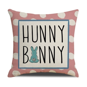 Macro detail of Easter linen pillowcase with pink polka dots and Hunny Bunny print