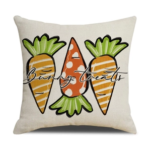 Detail of linen Easter pillowcase featuring three artistic carrots and Bunny treats text