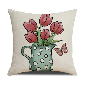 Detail of linen Easter pillow cover with tulip bouquet in a polka dot watering can