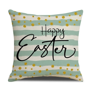 Detail of Happy Easter pillowcase with green stripes, gold sequins, and linen texture