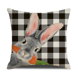 Détail de la taie d'oreiller en lin avec carreaux noirs et motif lapin mignon