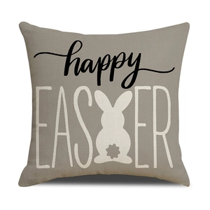 Vue détaillée de la texture du lin et de l'imprimé lapin Happy Easter sur une taie d'oreiller