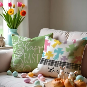 Zwei dekorative Osterkissenbezüge mit Ostereiern und He is risen Typografie für Sofa