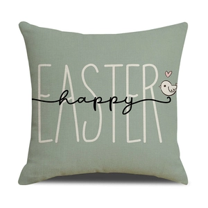 Detail of sage green Easter pillow cover showing woven linen texture and bird print