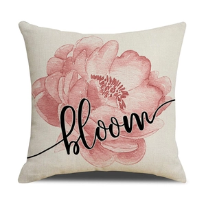 Gros plan sur la texture du lin avec fleur rose et lettrage artistique bloom imprimé
