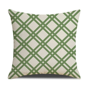 Detailed close-up of green diamond checkered pattern on linen throw pillow cover
