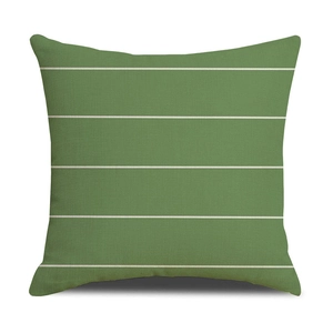 Macro shot of green and white striped linen fabric texture on square pillow cover