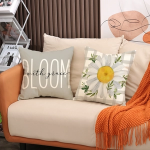 Modern spring fresh linen pillowcase set with BLOOM text and daisy print for sofa