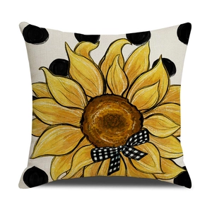 Detailed texture of cotton linen sunflower pillow cover with bow and polka dots