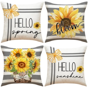 Detail of four sunflower pillow covers with linen texture and spring themed typography