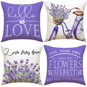 Detail view of four linen pillowcases featuring purple lavender and vintage bicycle prints