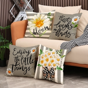 Set of 4 linen pillow covers with minimalist daisy floral prints and bloom text
