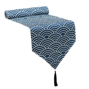 Oriental style blue wave pattern table runner with elegant black tassels decoration
