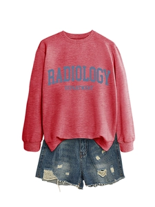 Detail of radiology department print sweatshirt with distressed denim shorts edge