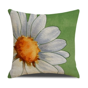 Detailed view of watercolor daisy print on linen cushion cover with rustic woven texture