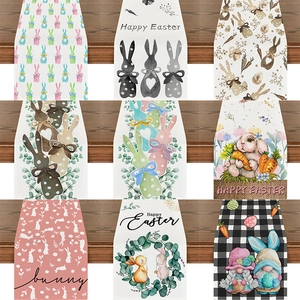 Detail view of Easter linen table runners featuring nine different bunny and gnome patterns