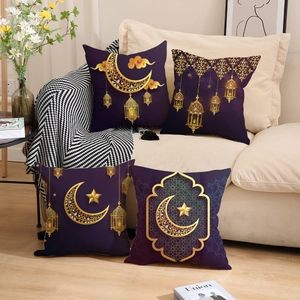 Set of four purple and gold Ramadan moon star cushion covers on a modern sofa