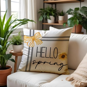 Linen sunflower pillow cover with hello spring letter print on white sofa with plants