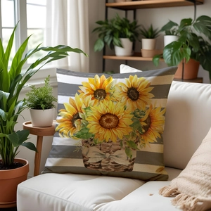 Linen sunflower pillow cover with floral print on white sofa with plants decor