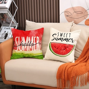 Close-up of summer watermelon throw pillow set on a cozy sofa with vibrant citrus prints
