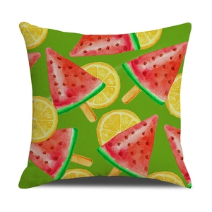 Close-up of watermelon and lemon print on linen cushion cover with vivid weave texture