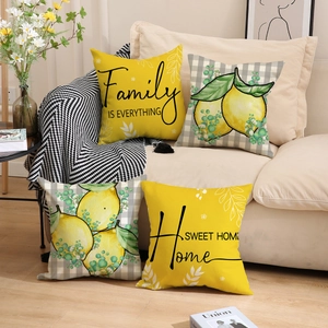 Lot de 4 housses de coussin citron et carreaux pour une déco de salon chaleureuse
