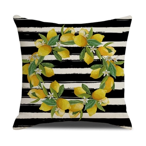 Breathable linen throw pillow cover with yellow lemon wreath and black striped pattern
