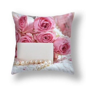 Square floral cushion cover with pink roses and pearl necklace print on quilted texture