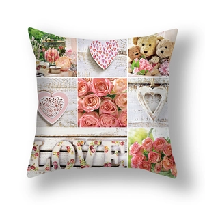 Detail of floral pillow case with LOVE letters, teddy bear, and rose collage print