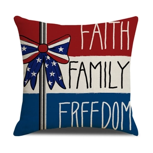 Close-up of cotton linen pillow cover with American flag stripes and patriotic text