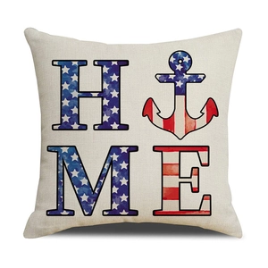 Detail of linen pillowcase featuring HOME text with American flag and anchor motifs