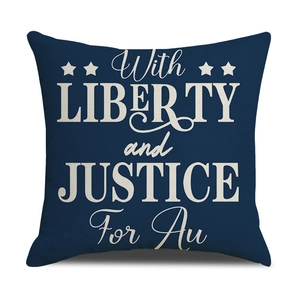 Detail of blue linen pillow cover with Liberty and Justice For All white printing