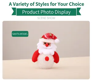 Close-up of glowing Santa Claus EVA night light with red nose and white beard details