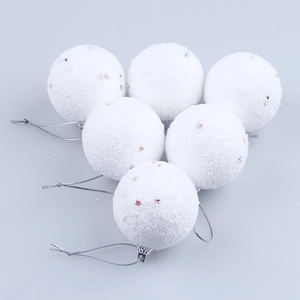 Detail of 4cm white snowballs with colorful star sequins and silver hanging cords