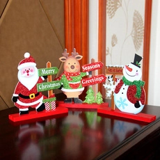 Three-piece Christmas desktop set with Santa, reindeer and snowman on red bases