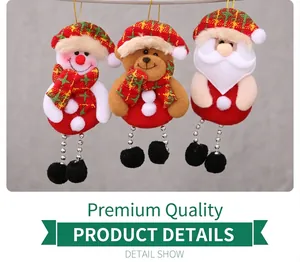 Detail of Christmas tree ornaments featuring plush Santa, snowman, and bear with bead chains
