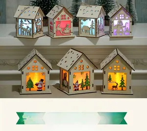 Detailed close-up of DIY wooden LED Christmas house ornaments with laser-cut patterns