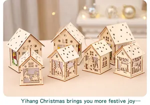 Detailed view of glowing laser-cut wooden Christmas house ornaments with reindeer patterns