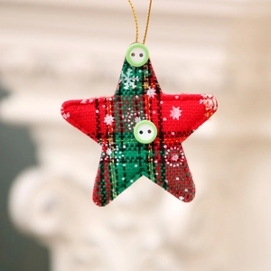 Plaid Christmas star ornament with festive red and green patterns and snowflake motifs