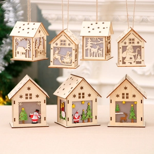 Handcrafted wooden Christmas house ornaments with warm holiday motifs for festive decor
