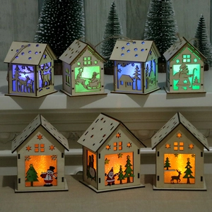 Lighted wooden Christmas house ornaments with laser cut reindeer and snowman patterns