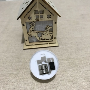 Lighted wooden Christmas house decoration with Santa Claus carving and LED base