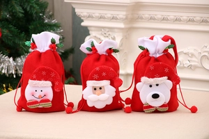 Three festive Christmas drawstring bags with 3D Santa, Snowman and Polar Bear dolls