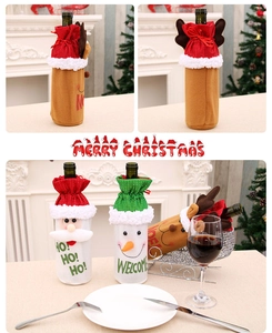 Detail of Christmas wine bottle covers with Santa, Reindeer and Snowman patterns