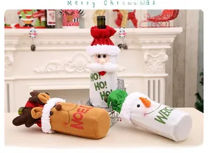 Three Christmas wine bottle covers featuring Santa, Reindeer and Snowman on a mantel
