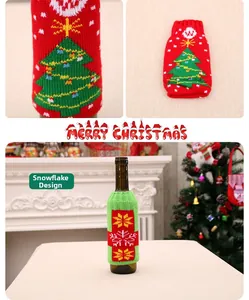 Detail of red and green knitted Christmas beer bottle covers with snowflake patterns